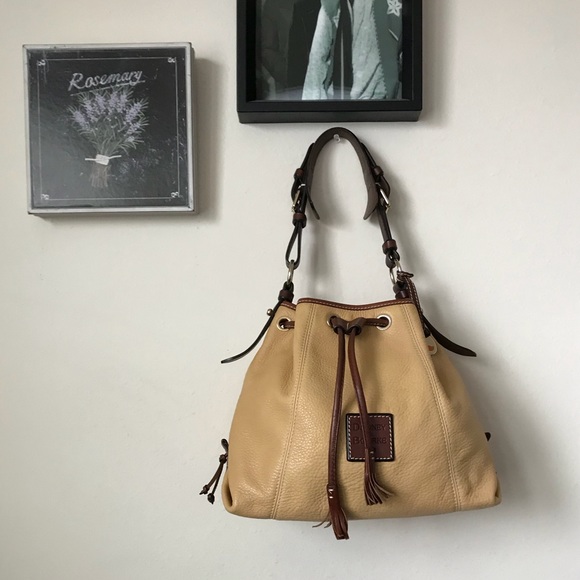 Dooney & Bourke Handbags - Dooney & Bourke Beige/Brown Bucket Bag
